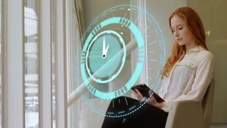 animation of moving clock over caucasian businesswoman using tablet in office