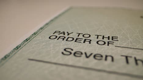 detail of a check area that says pay to the order of