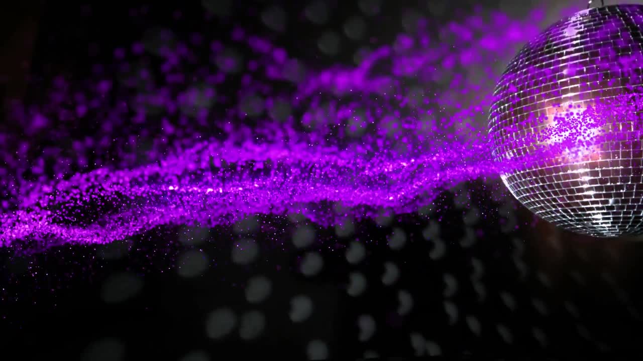 검은 바탕에 있는 디스코 볼 위의 빛 반점의 애니메이션