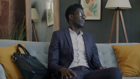businessman sitting on a couch