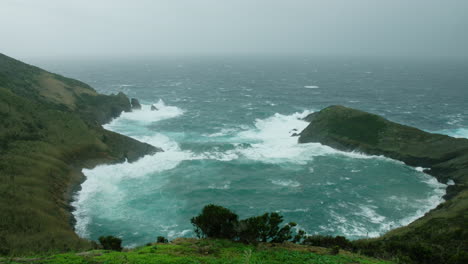 a stormy azorean coastline, from monte da guia, horta, azores