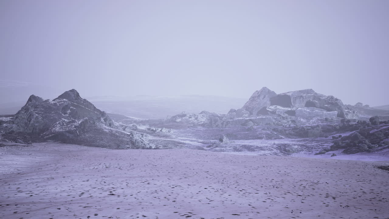 Vast icy landscape under a pale sky reveals natures frozen beauty in winter