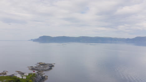 Aerial-View-Of-Skongenes-Lighthouse-And-Stadhavet-Sea-Near-Maloy-In-The-Island-Of-Vagsoy-In-Norway