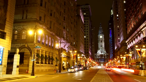 busy street timelapse - car lights flying by philadelphia city hall