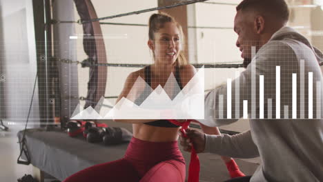 animation of data processing over diverse couple tying boxing bandages at gym