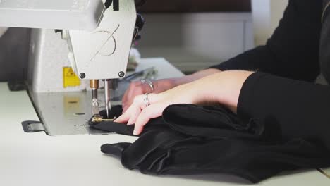 woman sewing with industrial machine