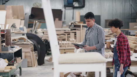 woodworkers collaborating in workshop