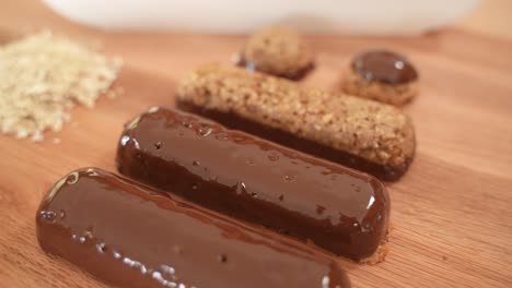 homemade energy protein bars, covered in chocolate, slow motion close up