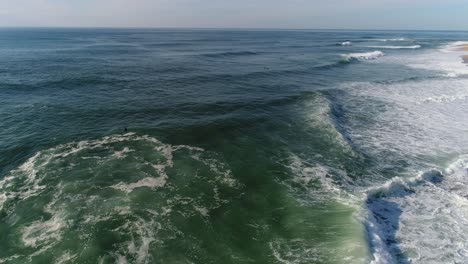 the famous surf waves of nazaré, portugal