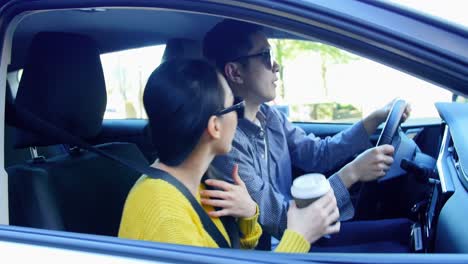 couple interacting with each other in car 4k