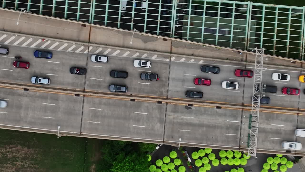 Traffic flows over a bridge in New York City captured from above