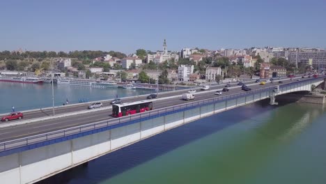 Slow-4k-aerial-shot-of-Sava-river-and-Branko-bridge-near-Kosancicev-venac,-Belgrade