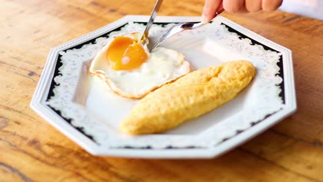 a fried egg and bread on a plate