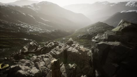 mountains in fog at sunset