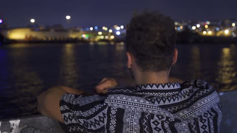 Man-traveling-on-the-ferry-in-the-evening.