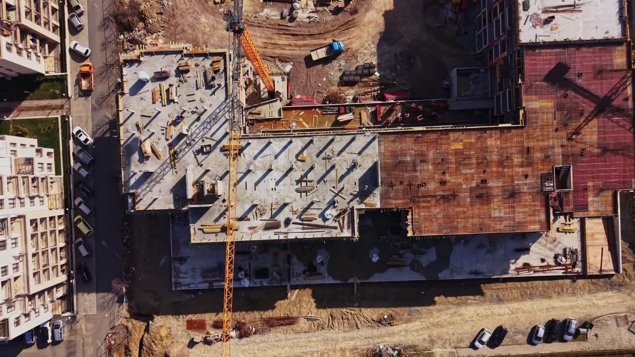 Aerial View of Large Residential Construction Site with Cranes