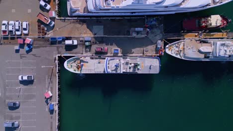 bird's eye drone view over luxury boat docked at fremantle harbour, perth, australia