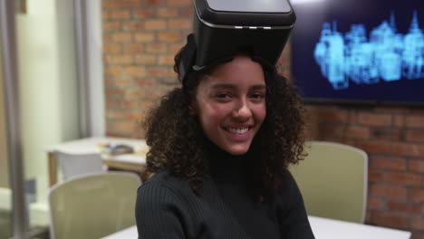 creative businesswoman using virtual reality headset in modern office