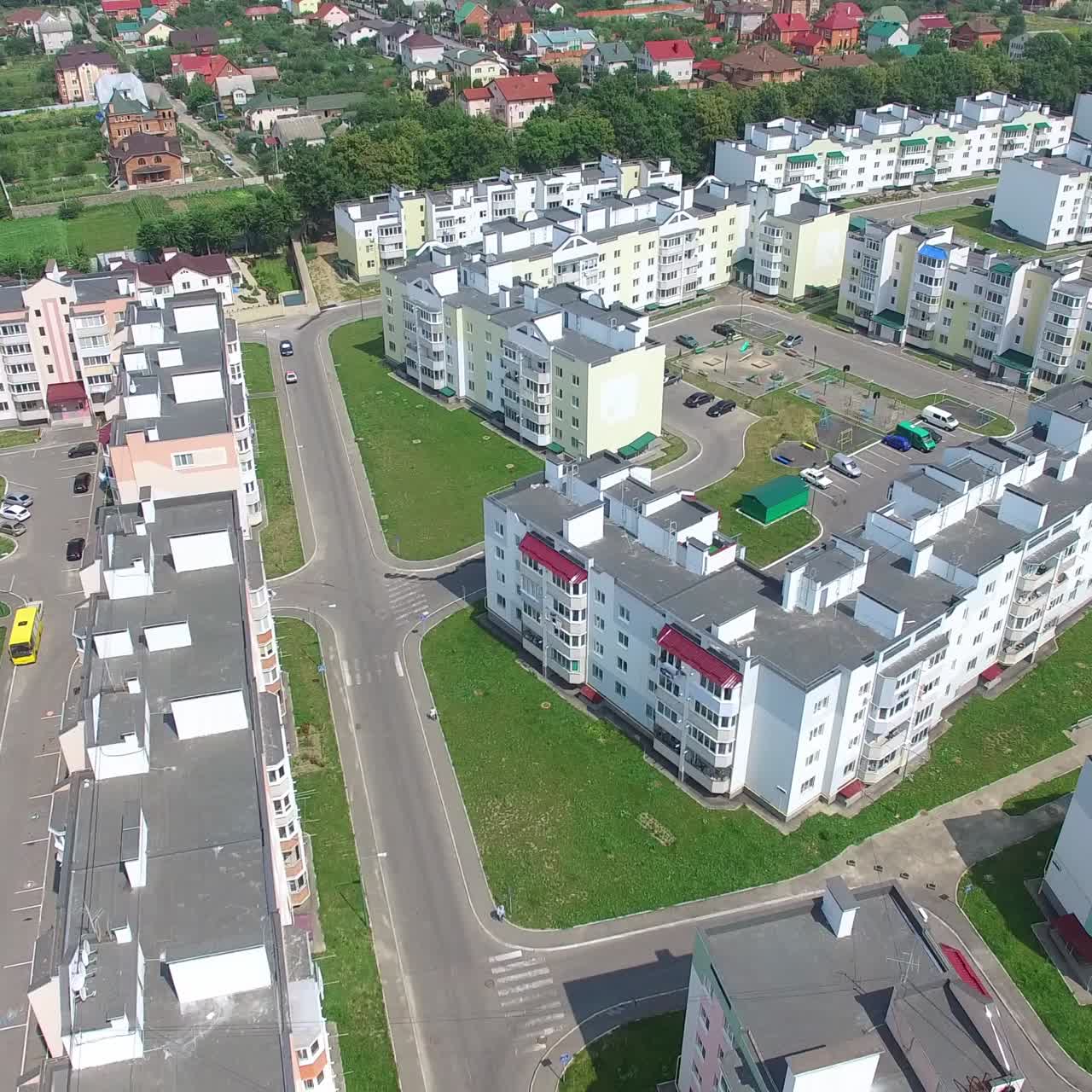 new modern quarter with high-rise buildings on the background of the urban view. Aerial view