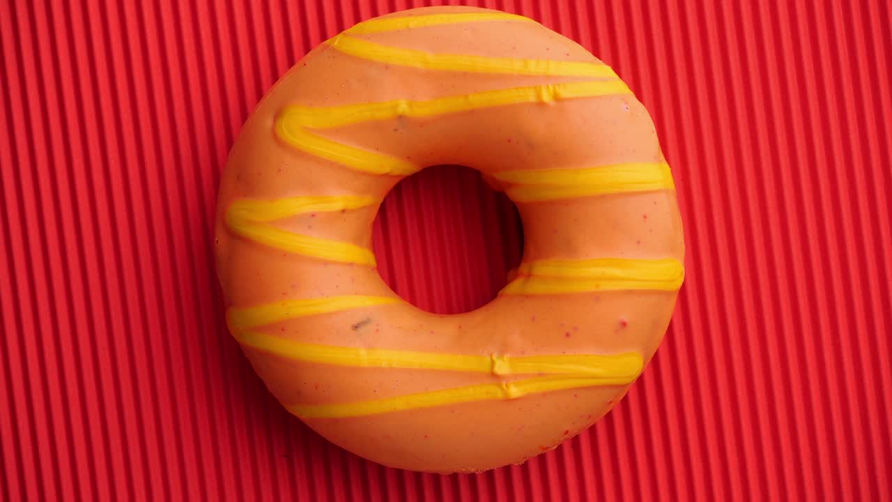 el donut está vidriado de cerca, con un bucle sin costuras.