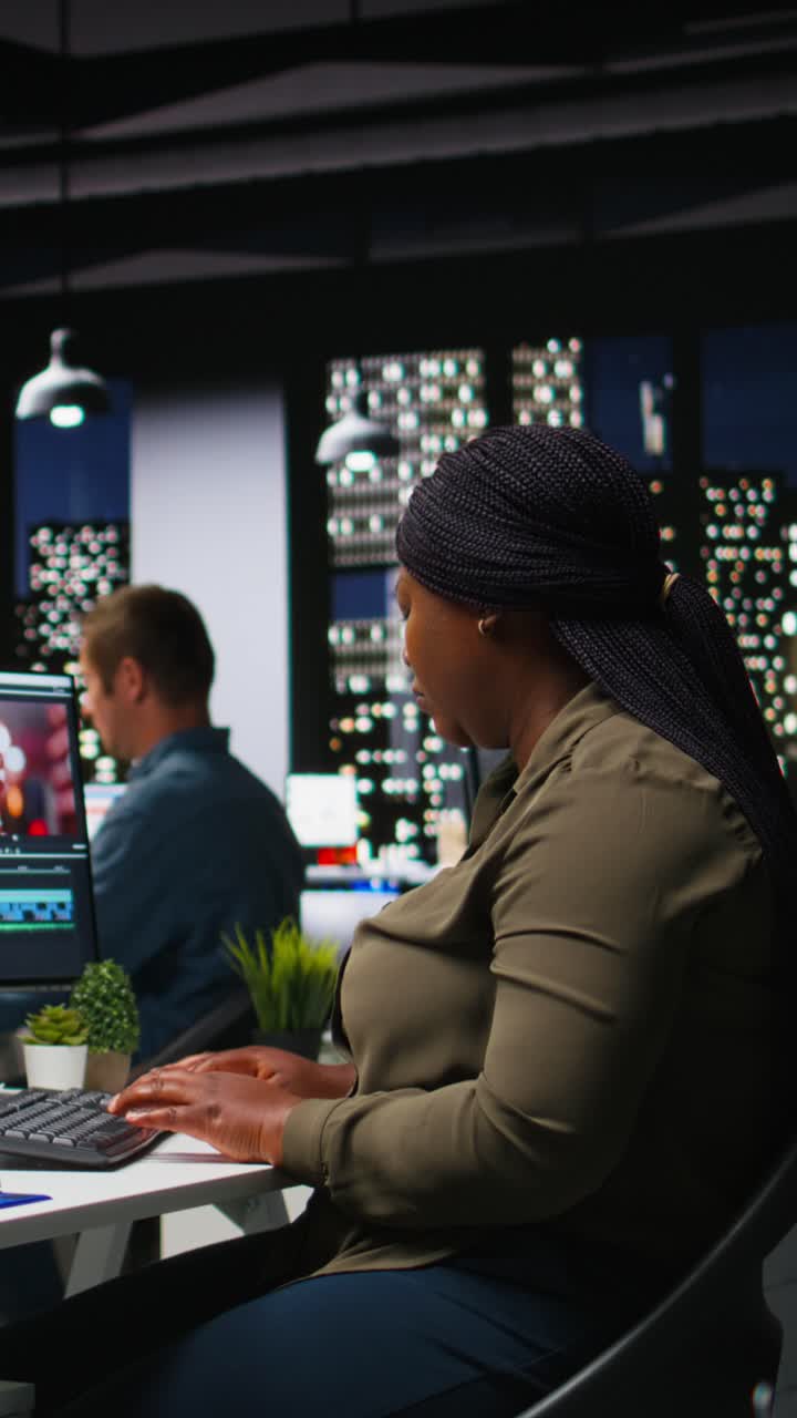 Vertical Video Woman video creator working on editing a movie montage project