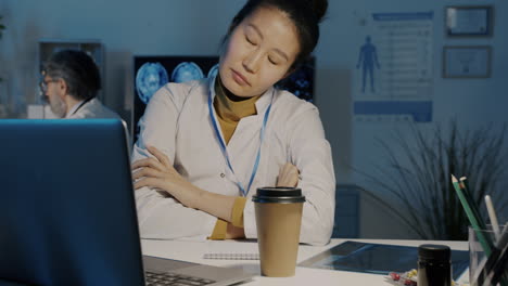 tired doctor working late night