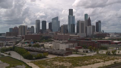 high angle 4k drone view of downtown houston at sunset