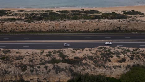 Speed-Traffic-Along-The-Coastal-Highway-Of-Megadim-Moshav,-Israel