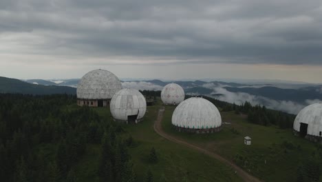 cinematic fly over of abandoned ussr radar station in carpathian mountains