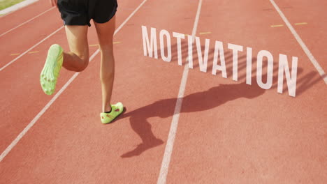 athletic man running with the word motivation on the floor