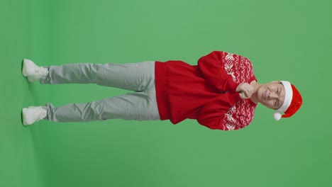 man in christmas sweater and santa hat