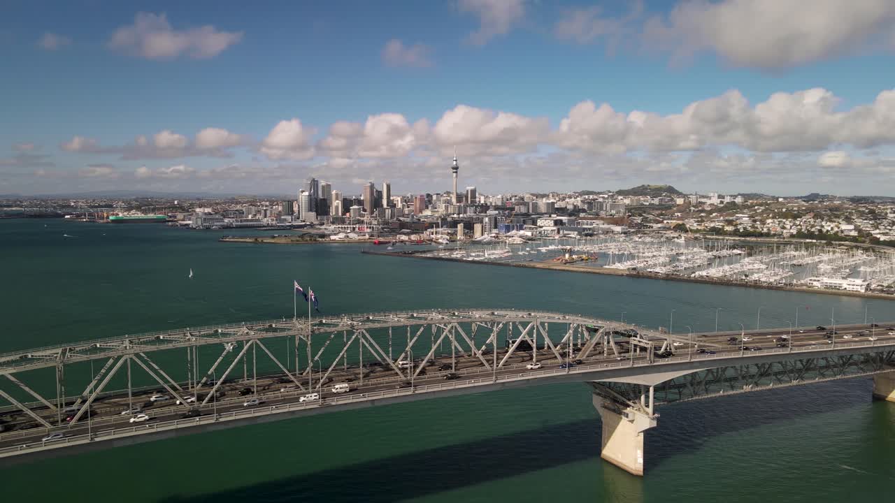 Bird's Eye View Of Auckland Harbour Bridge And City Landscape Of Auckland Near The Port In New Zealand