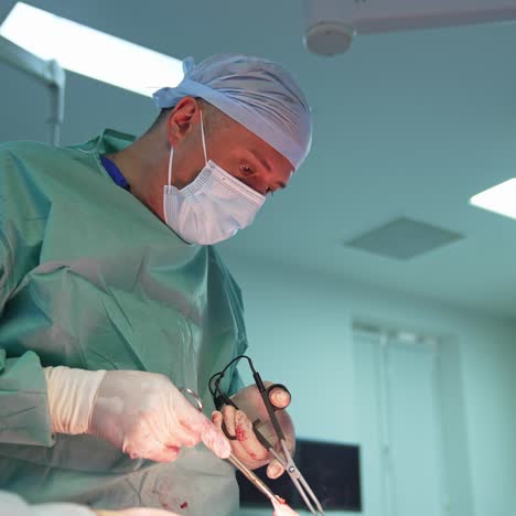 liposuction by professional doctor. surgeon doing a surgical procedure using special medical instruments in the operating room. work of plastic doctor in clinic