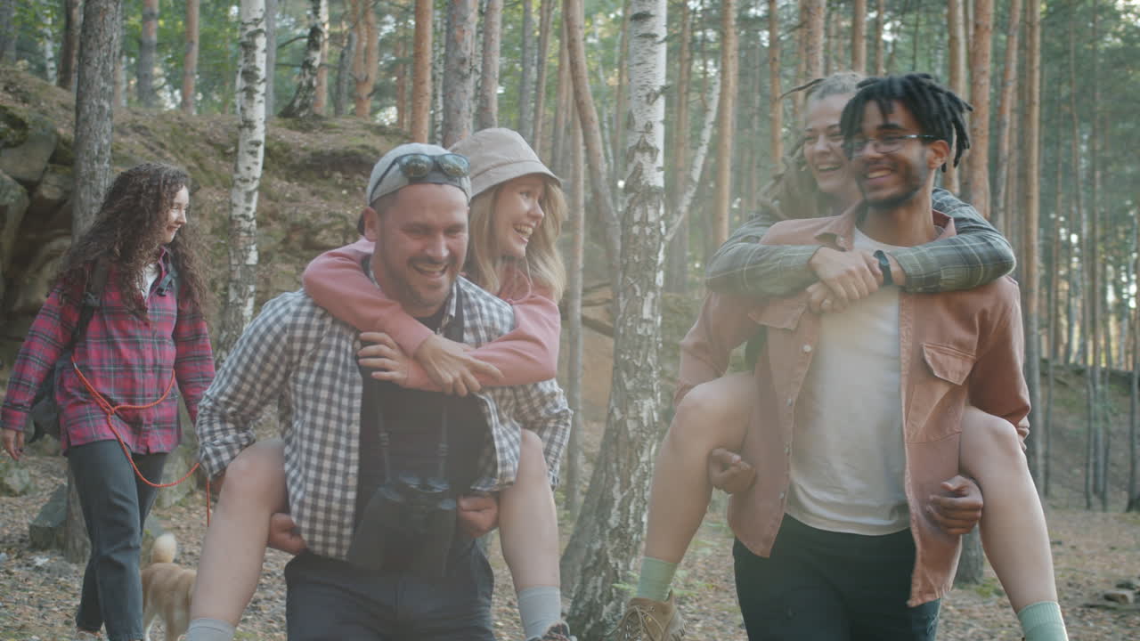Friends Having Fun on a Hike in the Forest