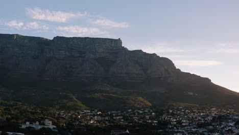 sunset drone shot of table mountain in cape town, south africa