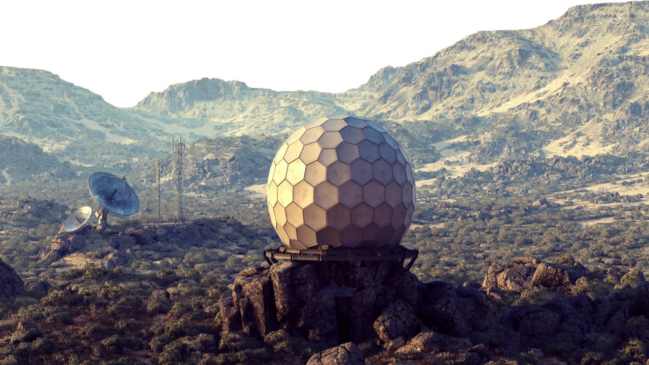 Observatory on rocky terrain captures breathtaking landscape at sunset