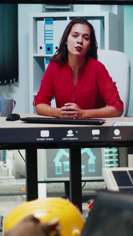 vertical video investors in office reviewing solar technology reports during videocall meeting