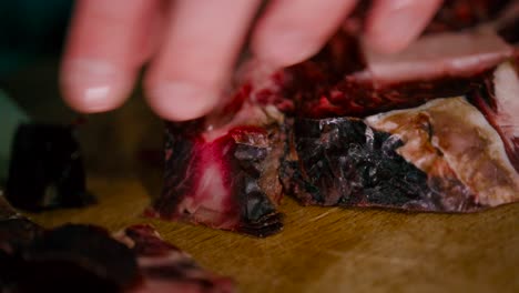 Close-up-view-of-Chef-slicing-the-steak-with-Steel-knife