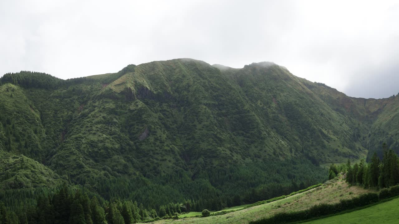 Time Lapse scenery in Sao Miguel Island, clouds passing by mountain and valley, Azores Archipelago.