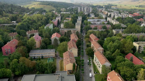 Moving-aerial-view-town-Hungary-Ózd,-sunny-day