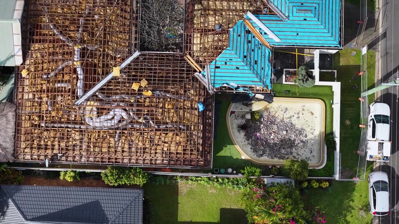 Aerial View of Residential Roof Renovation and Construction Site