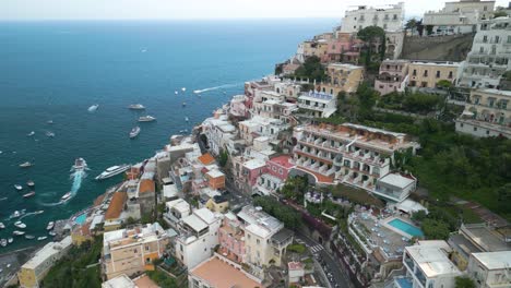 beautiful drone shot above positano cliffs in amalfi coast, italian riviera