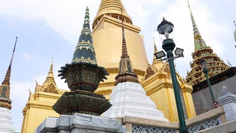 golden pagodas and intricate temple architecture in bangkok