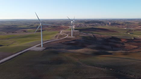 windmills in field on sunny day