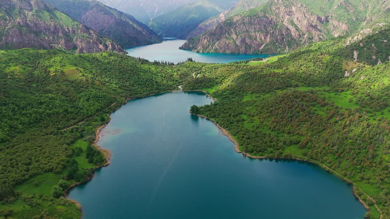Stunning aerial footage of Sary-Chelek Lake, Kyrgyzstan. UNESCO Biosphere Reserve natural wonder in Central Asia