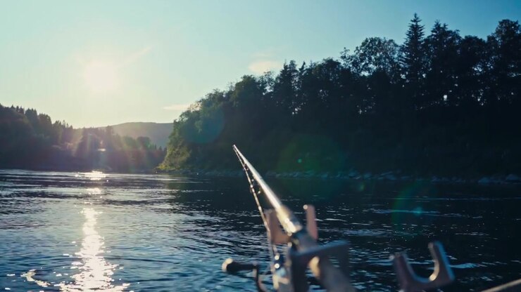 Fishing Rod Mounted In A Sailing Boat At Sunrise. Close-up Shot