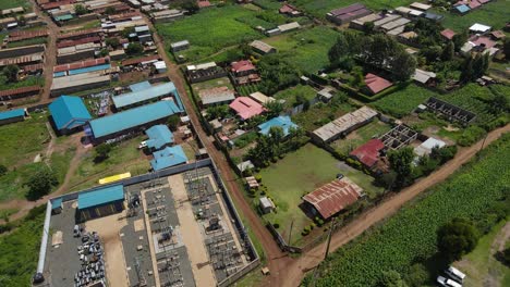 small community in rural area near antenna tower at daytime in kilimanjaro
