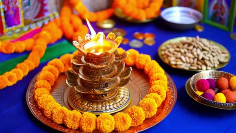 diya and marigold decoration for indian festival