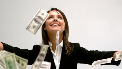 Money-falling-on-businesswoman