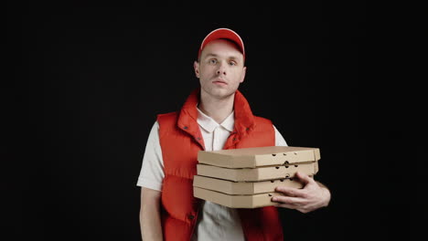 pizza delivery person with pizza boxes